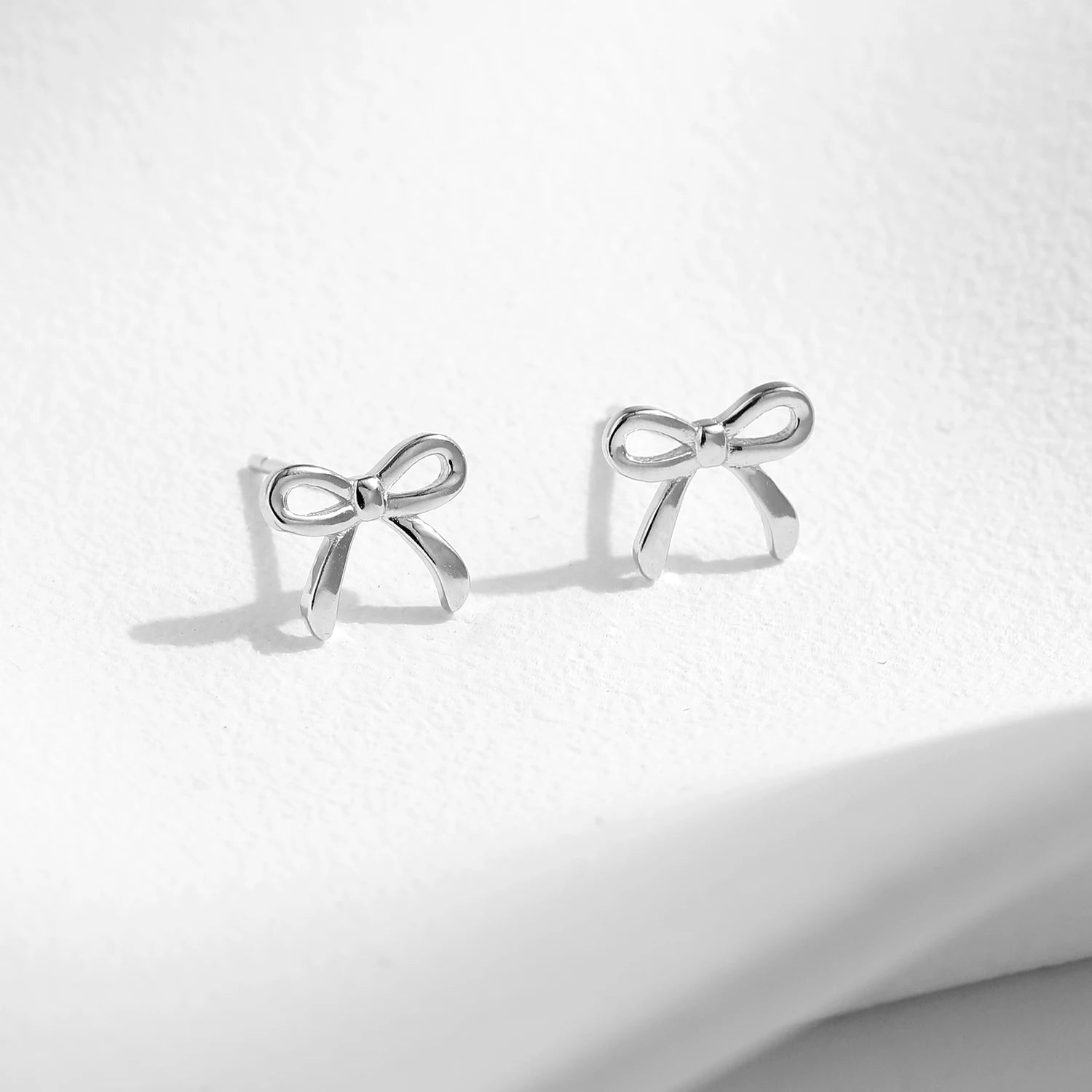 LISA BOW STUDS - NARAVOCO